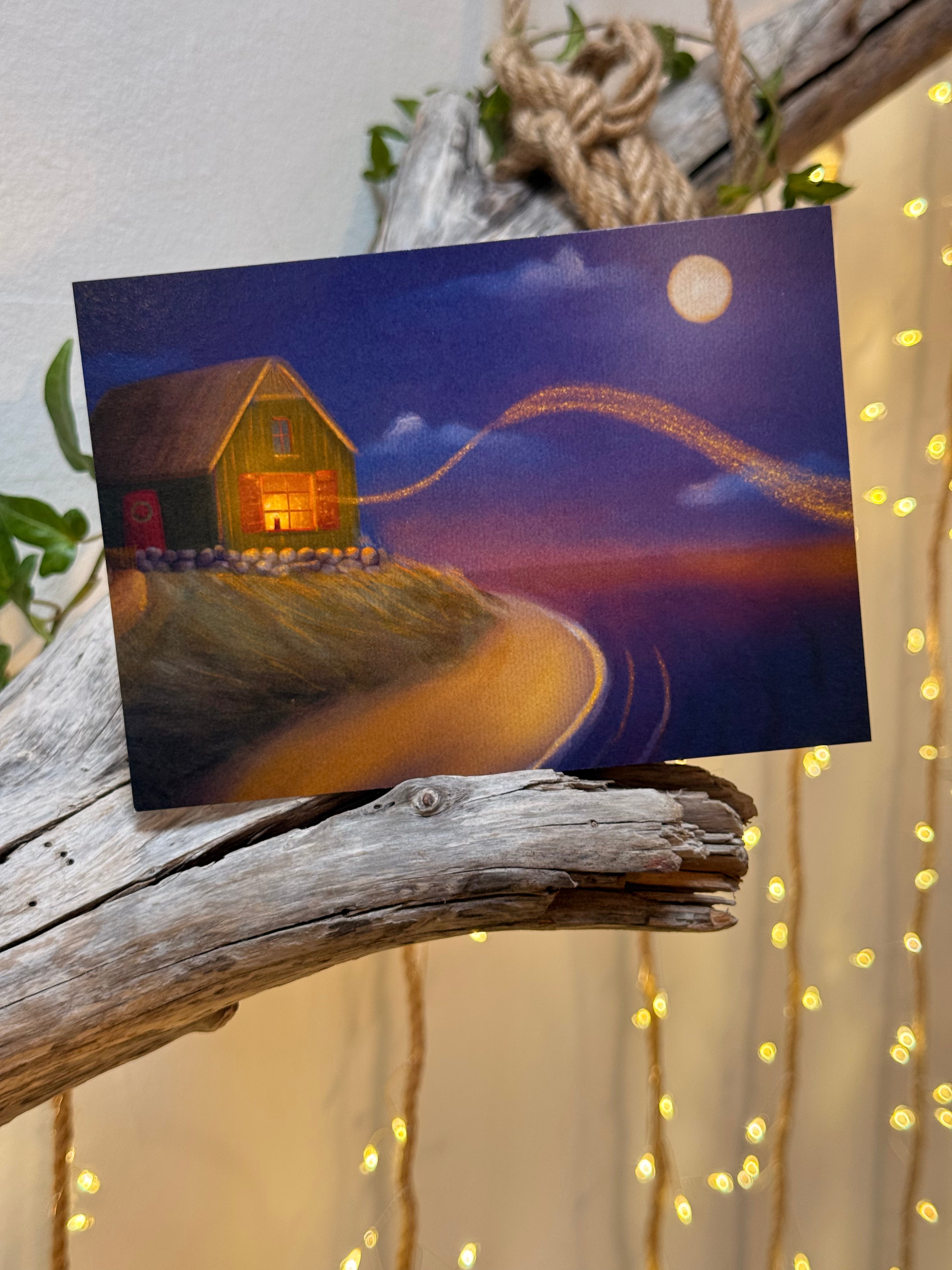 Postkarte "Kerze am Meer" | Eine weihnachtlich leuchtende Illustration.