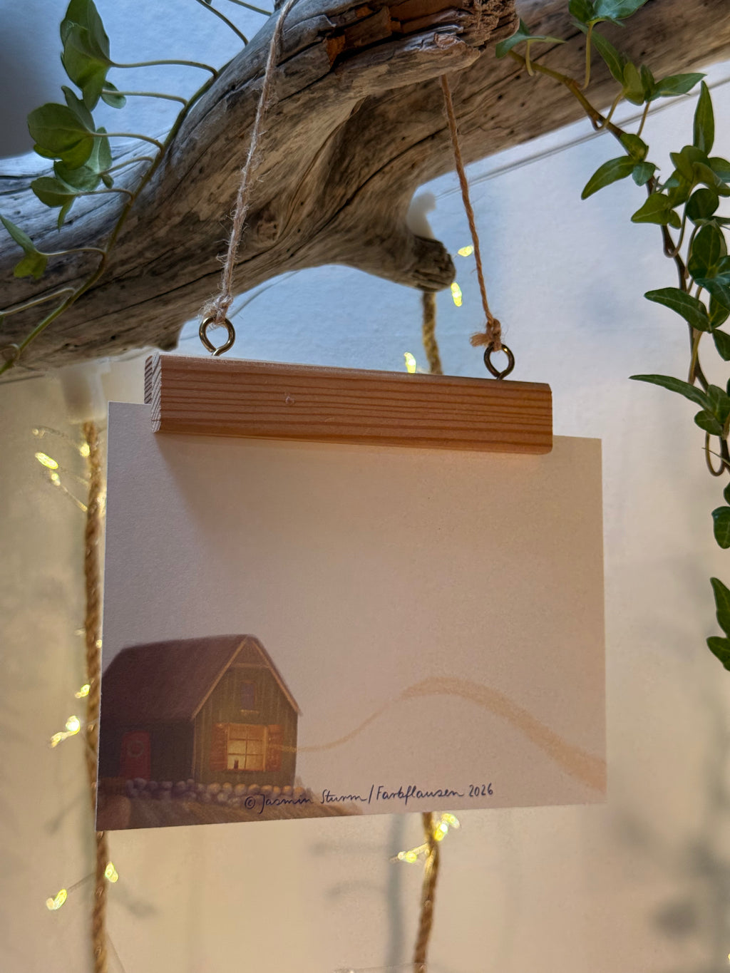 Postkarte "Kerze am Meer" | Eine weihnachtlich leuchtende Illustration.