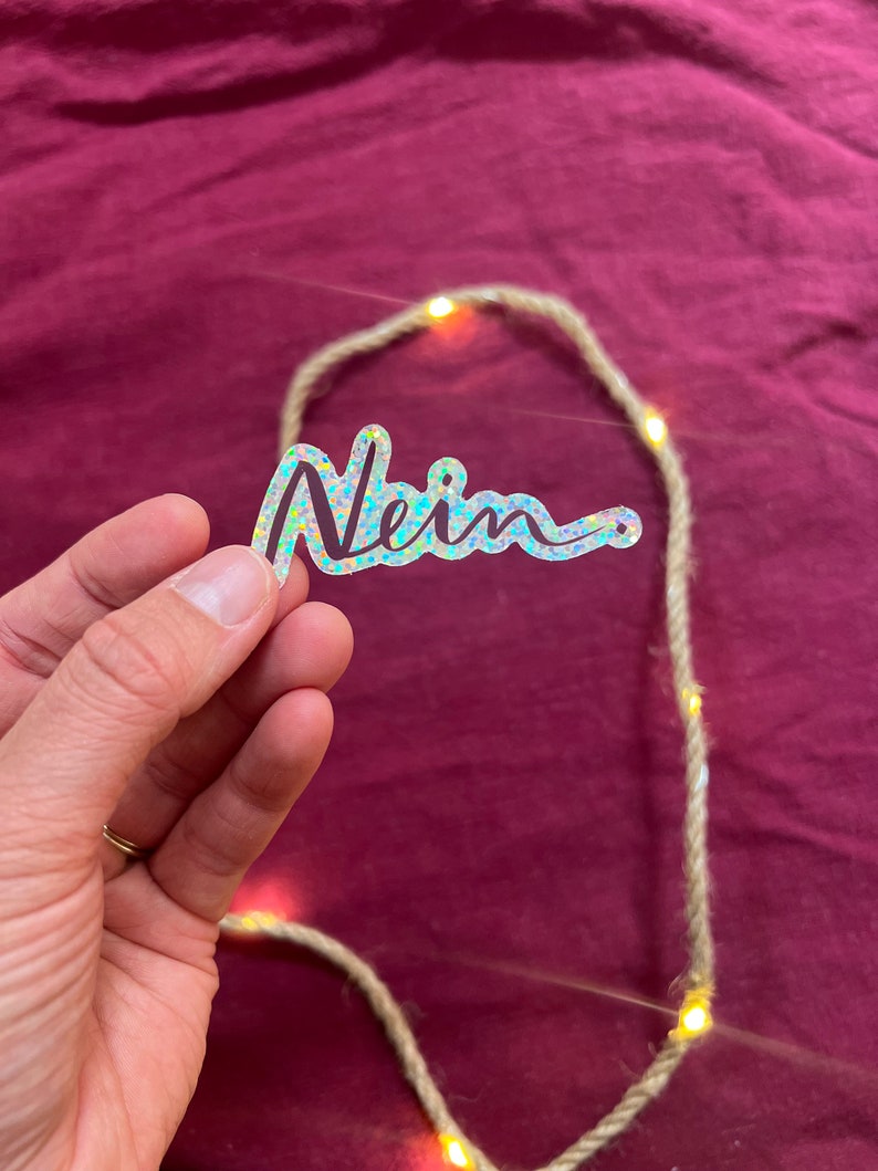 Sticker „Nein.“ | Ein hochwertiger Sticker mit Glitzereffekt über ein kleines Wort mit großer Wirkung - zur Personalisierung von Handy usw