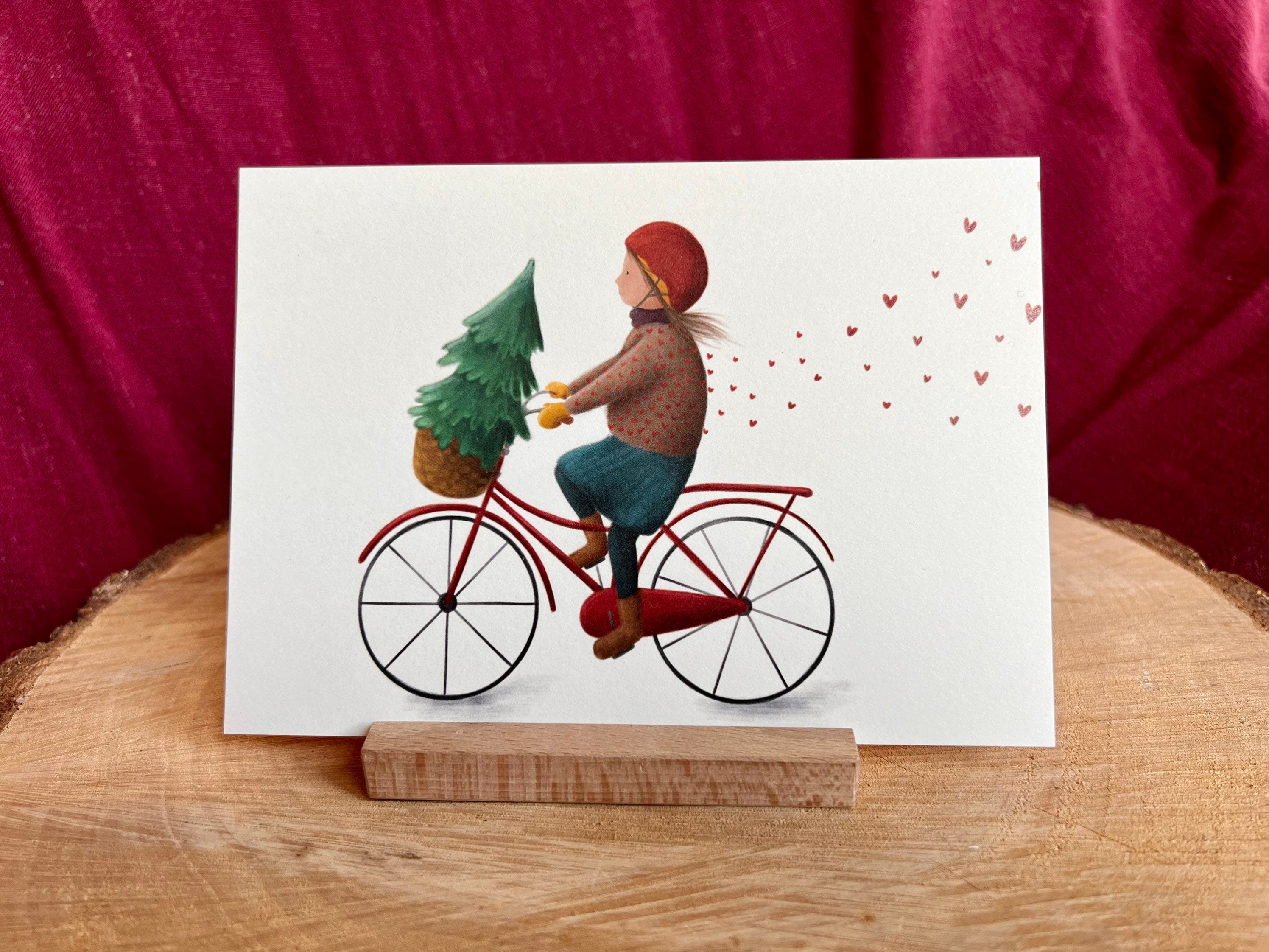 Postkarte „Dezembergefühle“ | eine besondere, liebevoll illustrierte Karte für alle, die Winter, Weihnachtsbäume und Fahrräder lieben.
