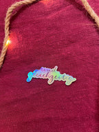 Sticker „Und gleichzeitig“ | Ein hochwertiger holographischer Sticker mit Regenbogeneffekt über Ambiguitätstoleranz und das Leben.